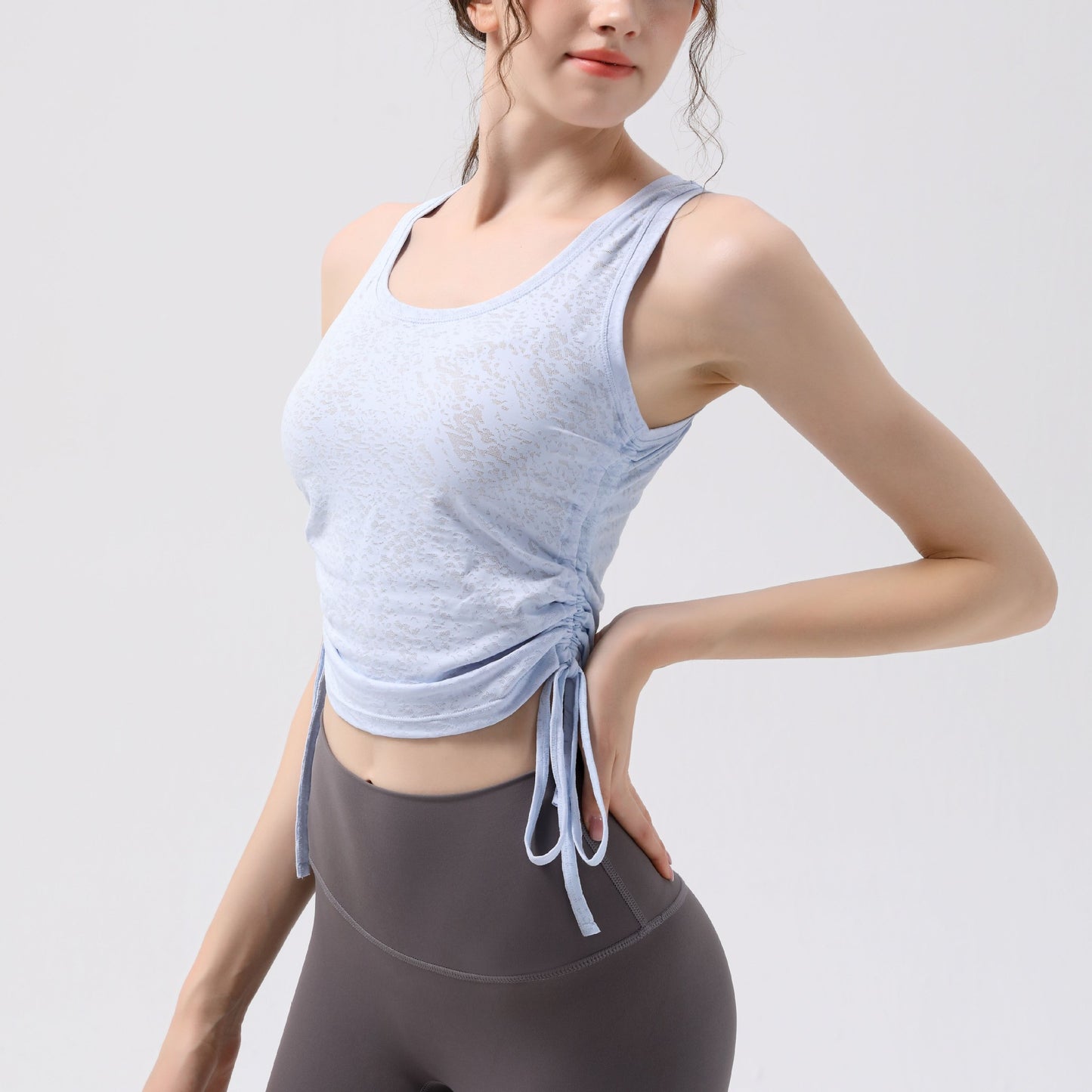 VEST WITH DRAWSTRINGS